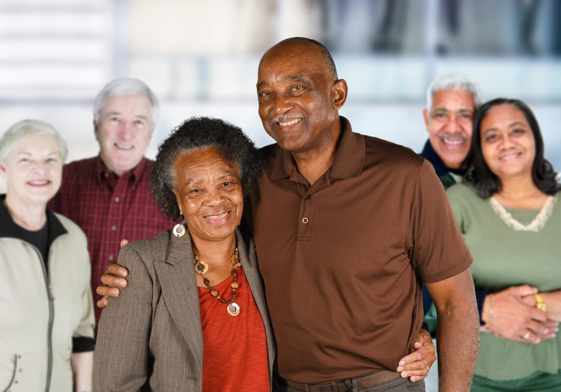 Elderly couples smiling together