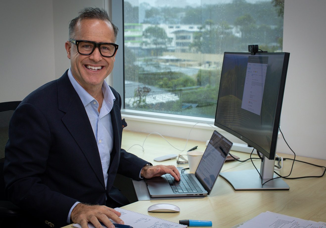 Paul Goudie CEO at desk